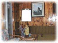 Our décor is knotty pine and plenty of relaxing furniture to relax on.